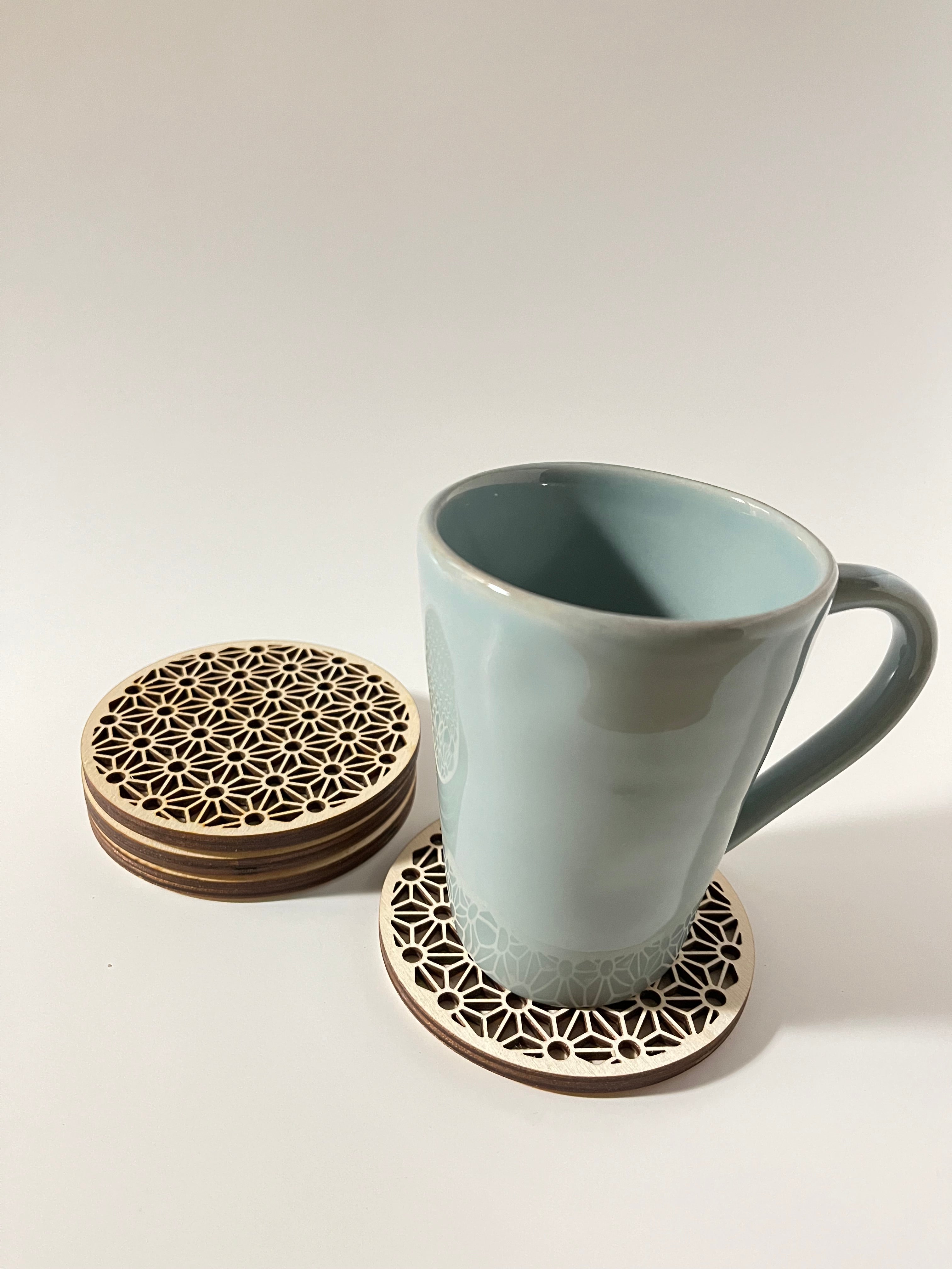 Handmade wooden coasters with etched with Kumiko design